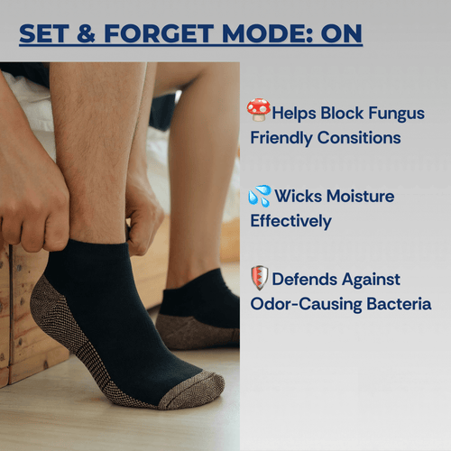 Person wearing black socks with text highlighting sock features on a light background